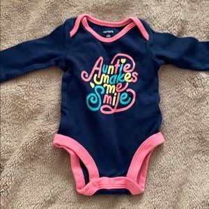 Baby girl “auntie make me smile” onesie